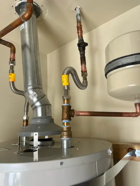 Water heater installation and plumbing repair in Coey